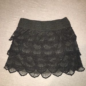 Black lacy mini skirt